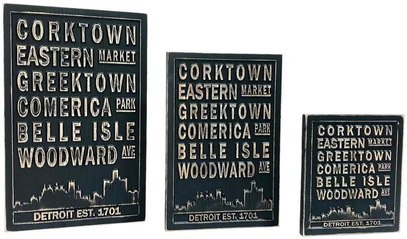 Carved ash subway-style signs stacked together.